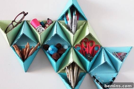 A green and blue origami shelf is decorative and has items in the pockets.