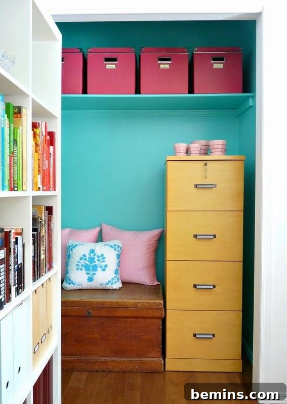 Visually Stunning: 17 Inspiring Workspace Designs 14 A closet has a yellow file cabinet and pink pillows next to it.