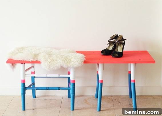 Shoes sit on a red white and blue table with a matching chair.