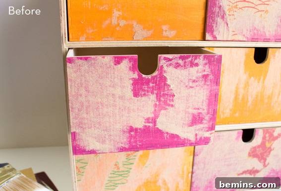 Close-up of pink and yellow drawers in the refurbished IKEA Fira organizer