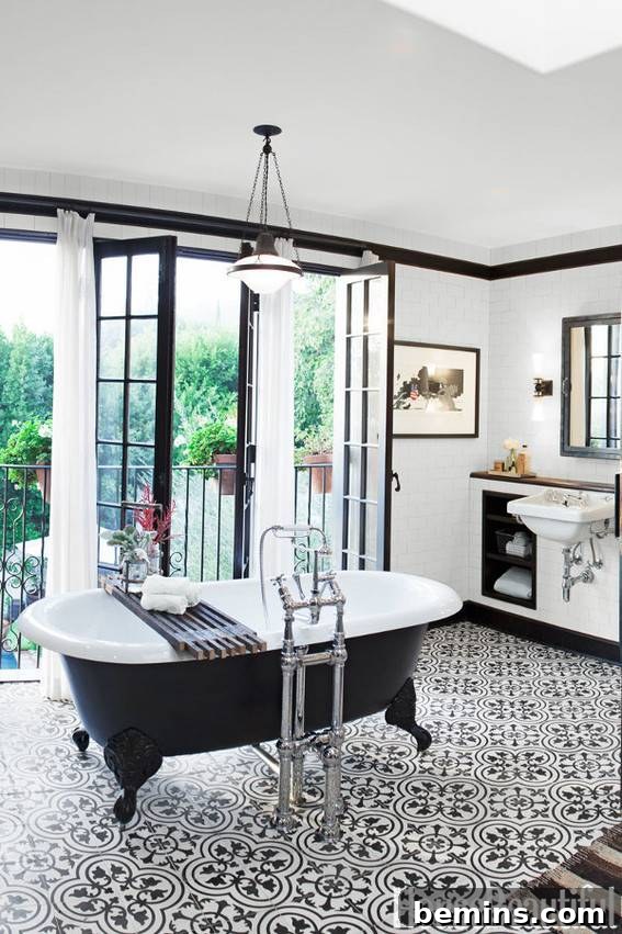 Eye-Catching Floors: 14 Stylish Bathrooms with Patterned Tile 8 Spacious bathroom with black and white tub and patterned floor tiles