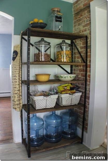 From Rusty Relic to Rustic Chic: A Shelf's Transformation 3 A rack situated in the corner holding glass containers, water bottles, and baskets.