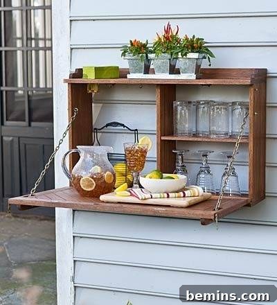 Outdoor sideboard with a flip-down serving surface.