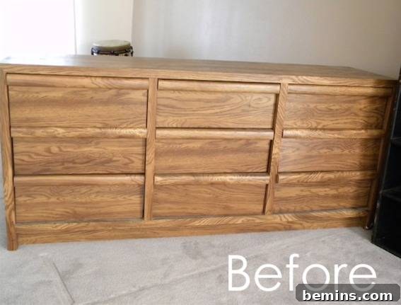 A large wooden dresser in a dark room.