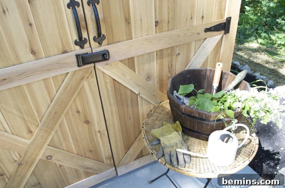 Refreshed Retreat: A Garden Shed and Backyard Transformation 13 Gardening gloves, watering can, and tools: Representing the joy and fulfillment of backyard gardening after the shed installation.