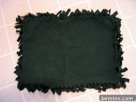 DIY ideas to turn a sweatshirt to cuddly blanket.