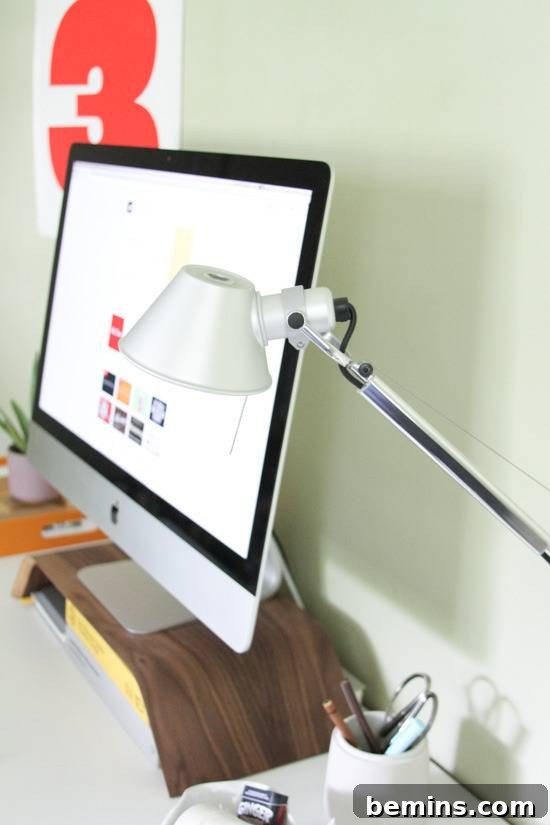 Desk Makeover: 6 Steps to a Stylish and Organized Workspace 5 A Desk with Monitor, Stationary and Table Lamp.