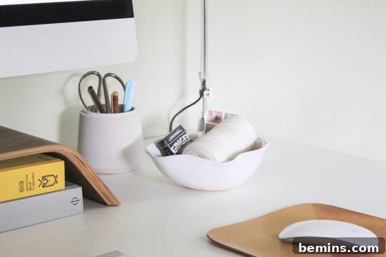 Desk Makeover: 6 Steps to a Stylish and Organized Workspace 7 A desk with a mouse and various office items neatly arranged.