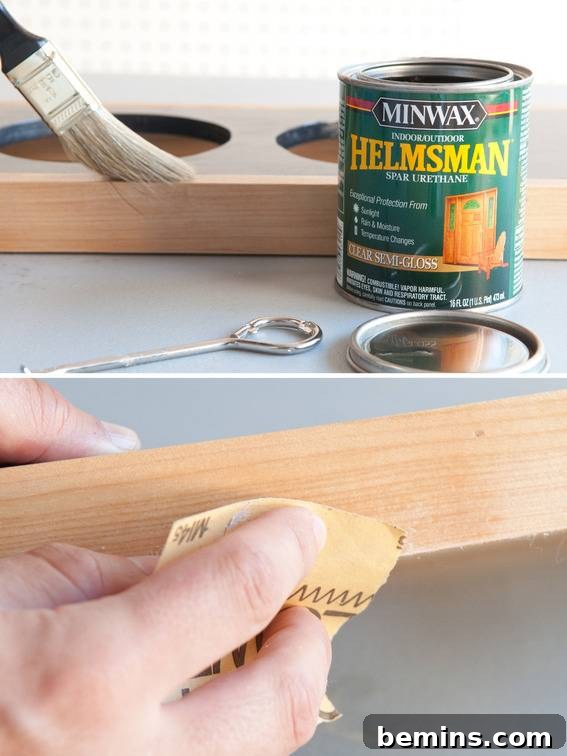 Sanding and sealing the wood.