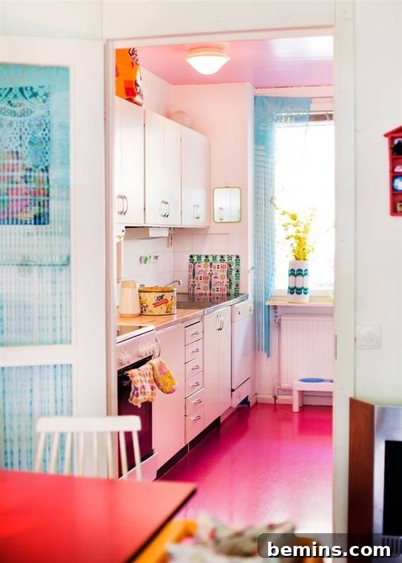 A room has bright pink and blue colors.