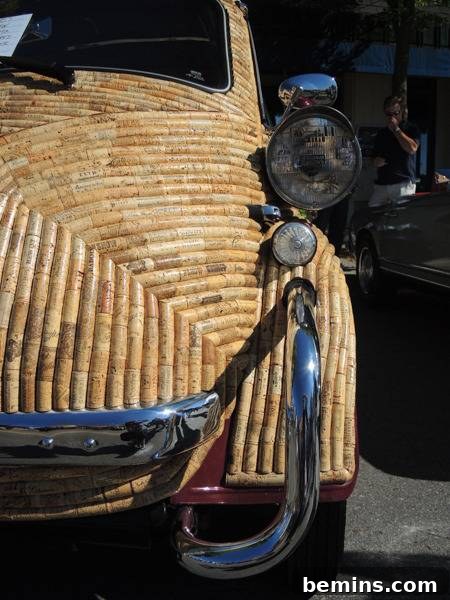 Corked Cruisin': The Ultimate Wine Cork Car 7 A side view of the cork-covered car, showcasing the intricate pattern and texture created by the wine corks.