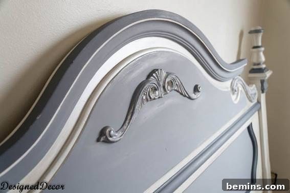 Headboard Hassle: DIY Disaster or Divorce Decree? 4 A blue-grey carved headboard.