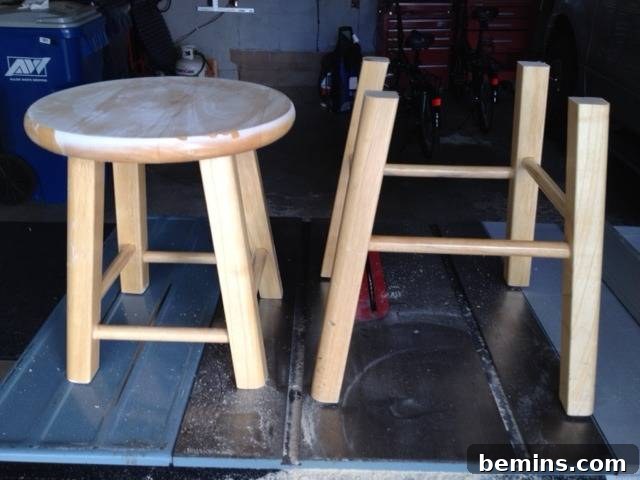 Double the Seating: A DIY Stool Split 4 Wooden bar stool cut in half to create two stools. Showing the division of the stool into two parts.