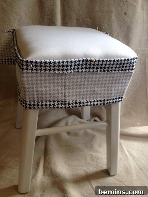 Double the Seating: A DIY Stool Split 9 Stool with DIY cushion, showing the fabric pieces pinned and basted in place.