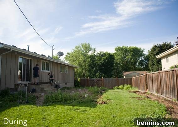 From Cluttered to Chic: A Backyard Deck Transformation 7 A newly constructed fence offering privacy on the side of the backyard.