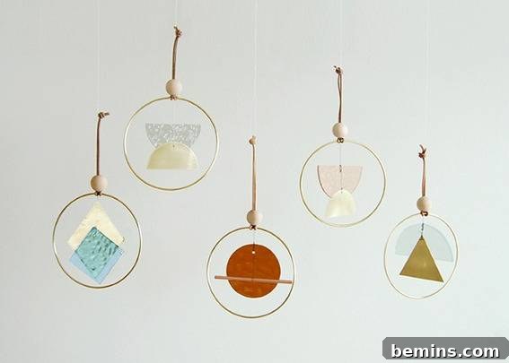 Five dream catchers hanging on a wall.