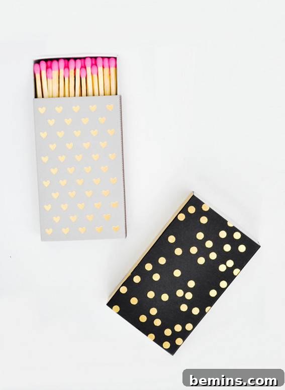 Two gold foil matchboxes with polka dot patterns.