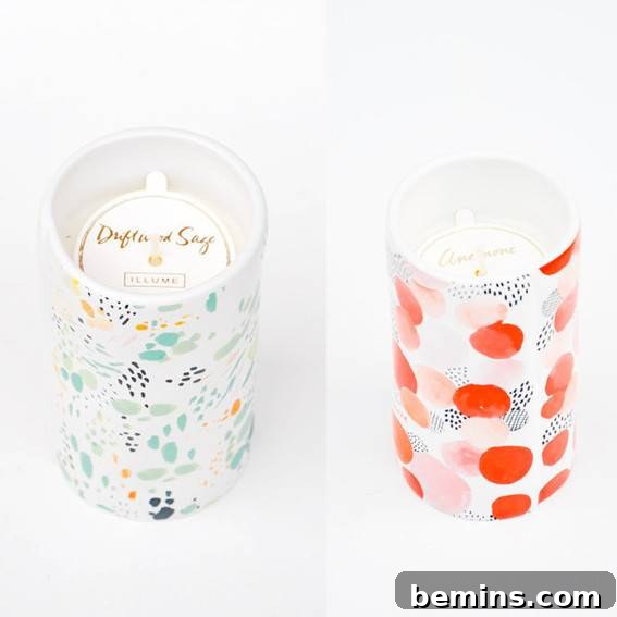 Two designed candles in jars.