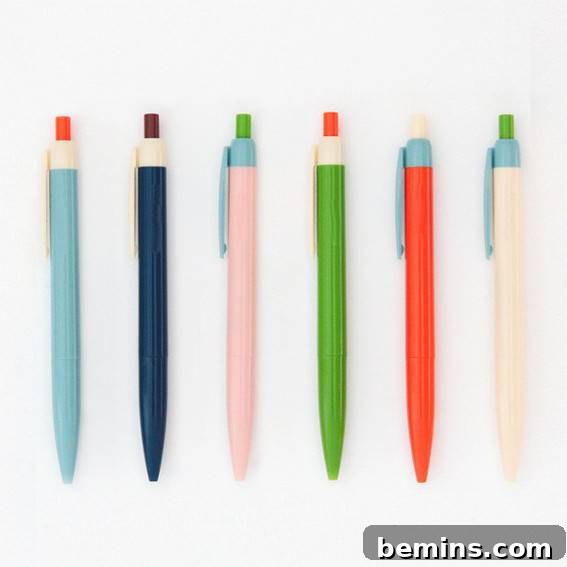 A row of colorful colorblock pens.