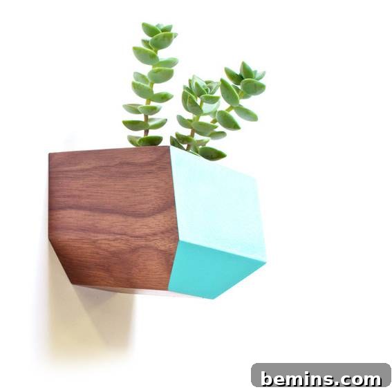 A brown and blue planter with a green plant.