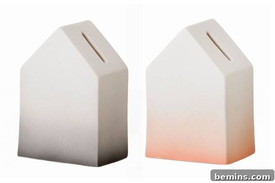 A ceramic house bank with two different tints.