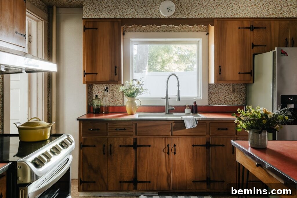 A kitchen with wooden cabinets and a stove top oven