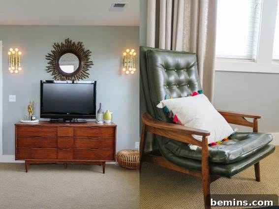 A modern bedroom setup with a flat screen TV mounted above a wooden dresser, complemented by a sleek black chair.