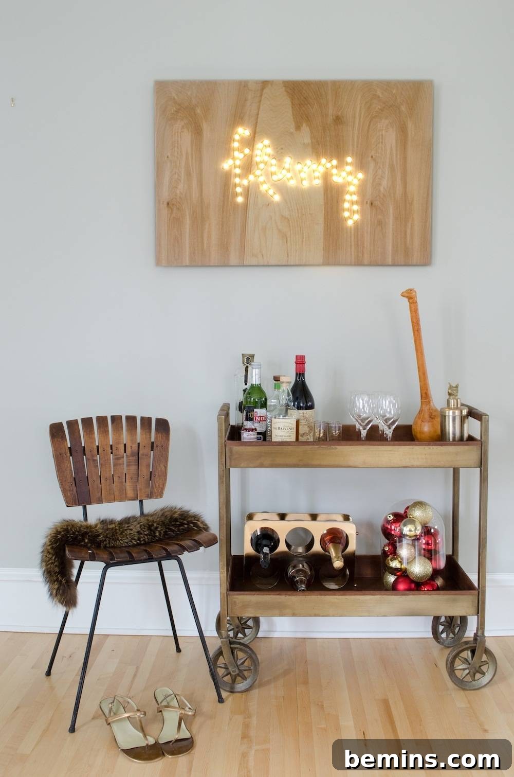 How to Design Your Own Dazzling Light-Up Sign 11 The finished DIY holiday lighted sign displayed on a stylish bar cart, adding a touch of festive cheer to the home.