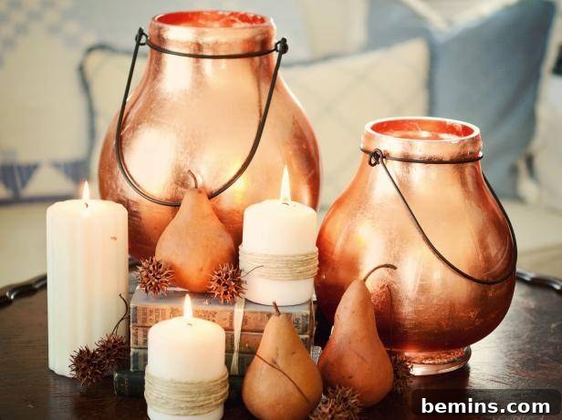 Golden Thanksgiving: 13 DIY Decor Ideas in Gold & Copper 12 Elegant Thanksgiving centerpiece with pears, white candles, and gold candle holders.