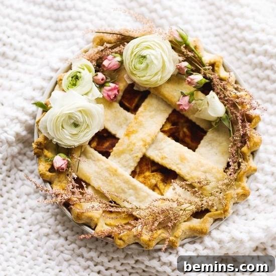 9 Recipes and Decoration Ideas to Elevate Your Thanksgiving Pie 11 Pie decorated with a floral wreath