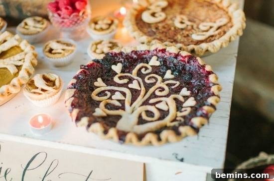 9 Recipes and Decoration Ideas to Elevate Your Thanksgiving Pie 10 Pie crust decorated with a tree design