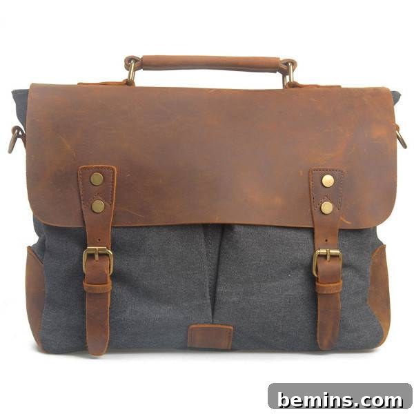 Leather and fabric hand bag with two buckles. Leather and Canvas Messenger Bag from Zioy.