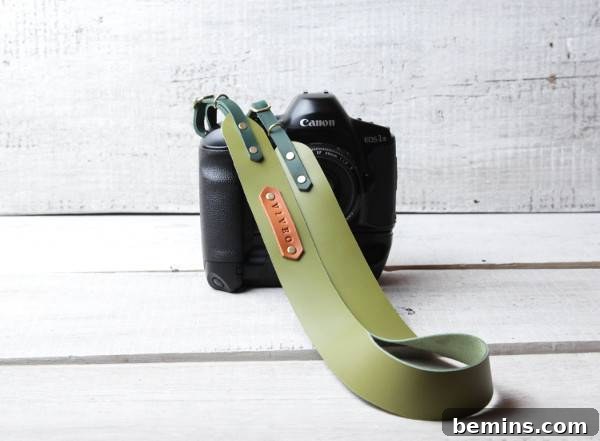 A camera with a slick handmade hanger. Personalized Leather Camera Strap from Studio Fi.