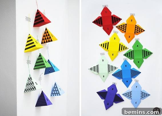A wall has colorful decorative origami art on it.