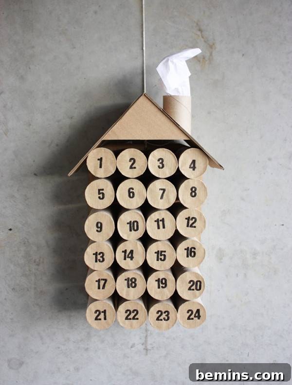 Numbers on wood circles create the dates of an advent calendar designed to look like a birdhouse.
