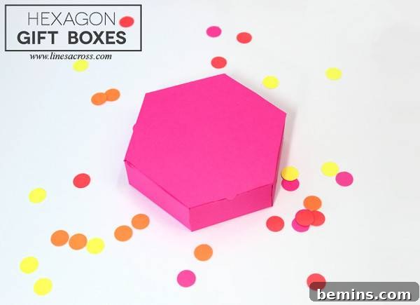 A pink hexagon gift box surrounded by dots.