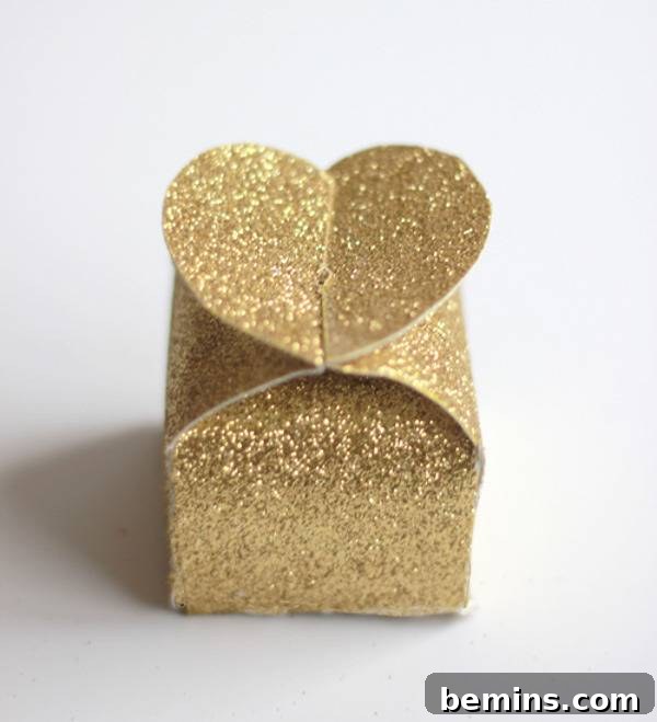 A Gift Box Wrapped with Gold Colored Paper.