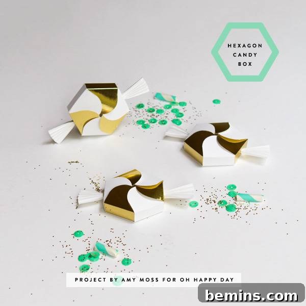White and gold candy decorations sit near green sparkles.