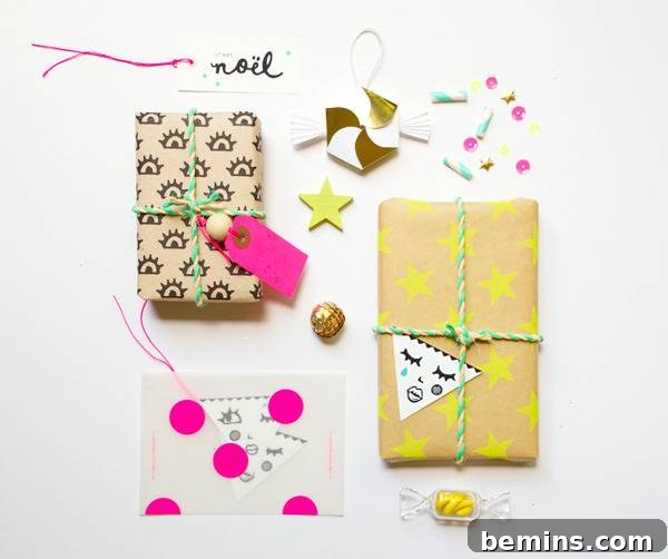 Two gifts have been wrapped among sparkly decorations.