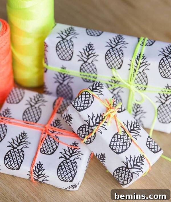 Packages wrapped in white and black pineapple print wrapping paper.