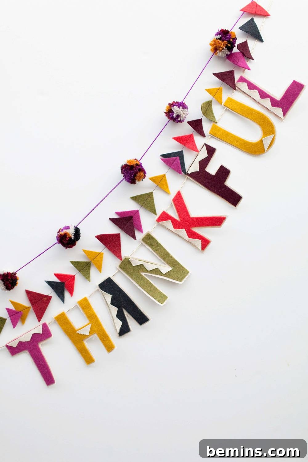 Quick & Easy Thanksgiving Table: 13 DIY Ideas Under an Hour 3 DIY Thanksgiving banner with colorful paper letters spelling 'THANKFUL'.