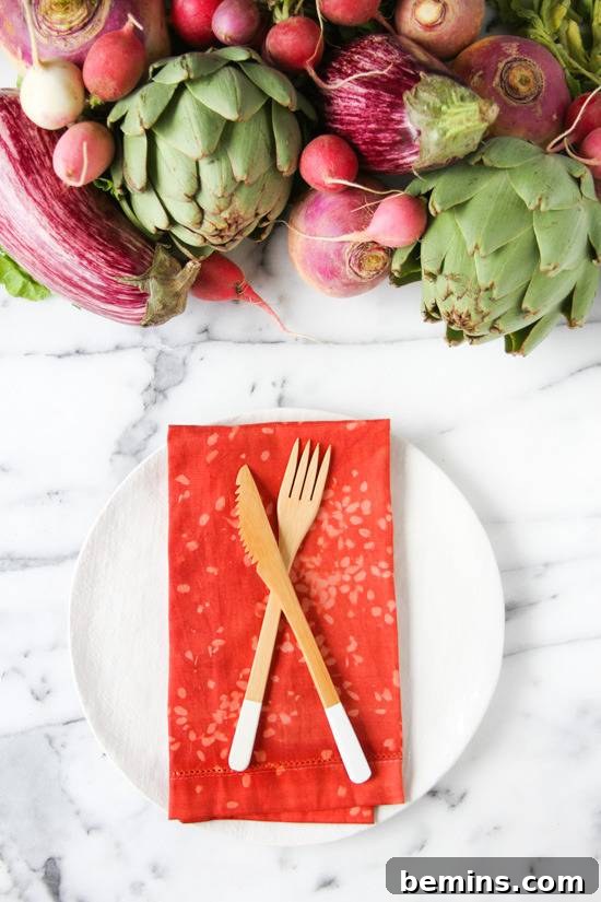 Quick & Easy Thanksgiving Table: 13 DIY Ideas Under an Hour 8 DIY Lumi dyed napkins with a vegetable centerpiece on the table.