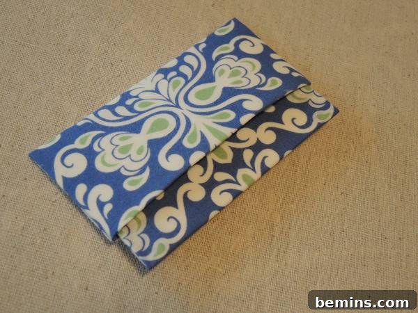 A Floral No_Sew Fabric Gift Envelop , demonstrating the assembled fabric gift envelope.
