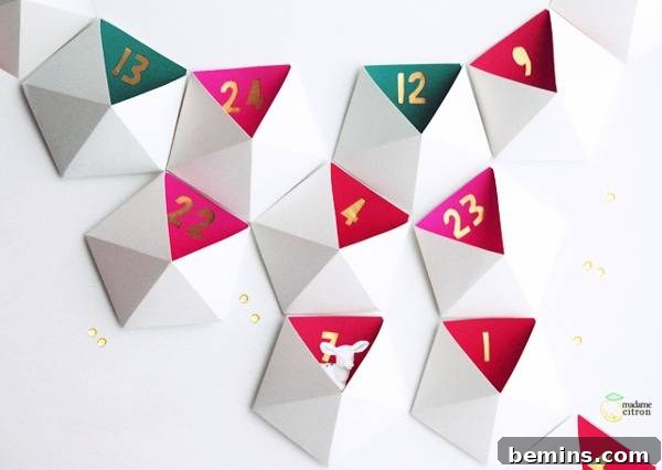 White, pink & green decor hang on a white wall.