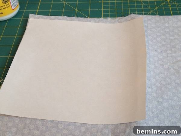 A piece of paper on the backside of the fabric.