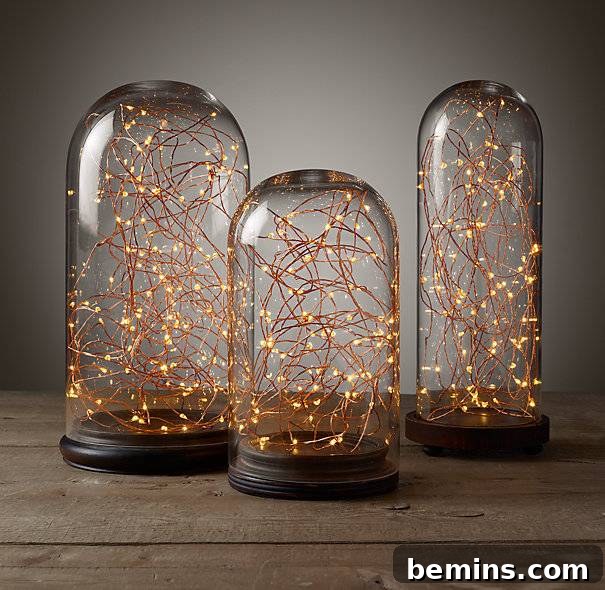 Quick DIY Glowing Cloche Decor 3 Restoration Hardware's cloched starlights are DIYable.