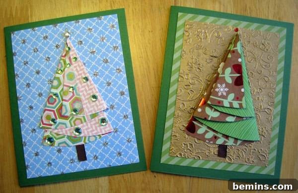 Two raised cut out Christmas cards with Christmas trees on them.