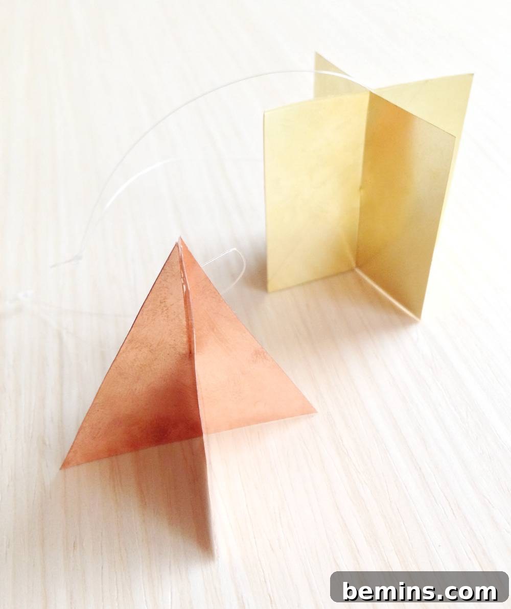 Paper folded into geometric shapes for inspiration.