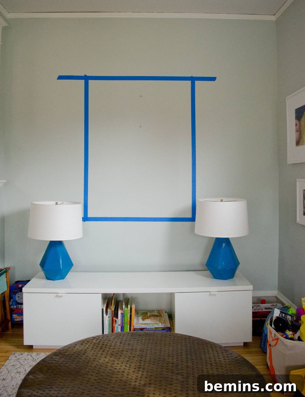 Vintage Flashcard Wall Decor Ideas 5 A taped off area is above a bench with storage.