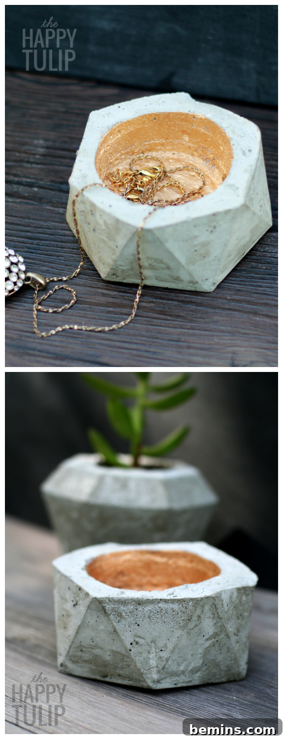 A close-up of geometric concrete bowls used to hold jewelry